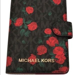 Jet set Michael Kors logo floral wallet